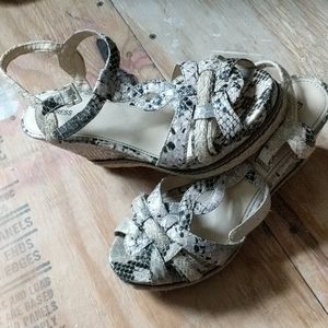 Snakeskin express heels